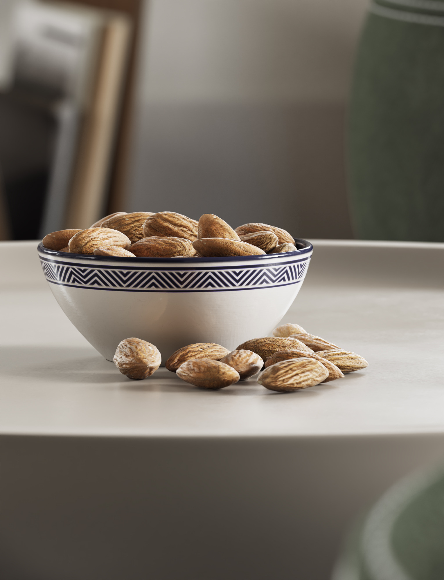 Bowl of almonds on a white table