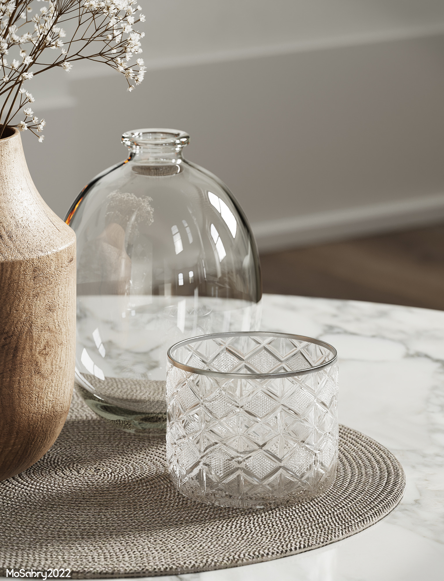 Glass cloche, crystal tumbler and wooden vase on a marble table