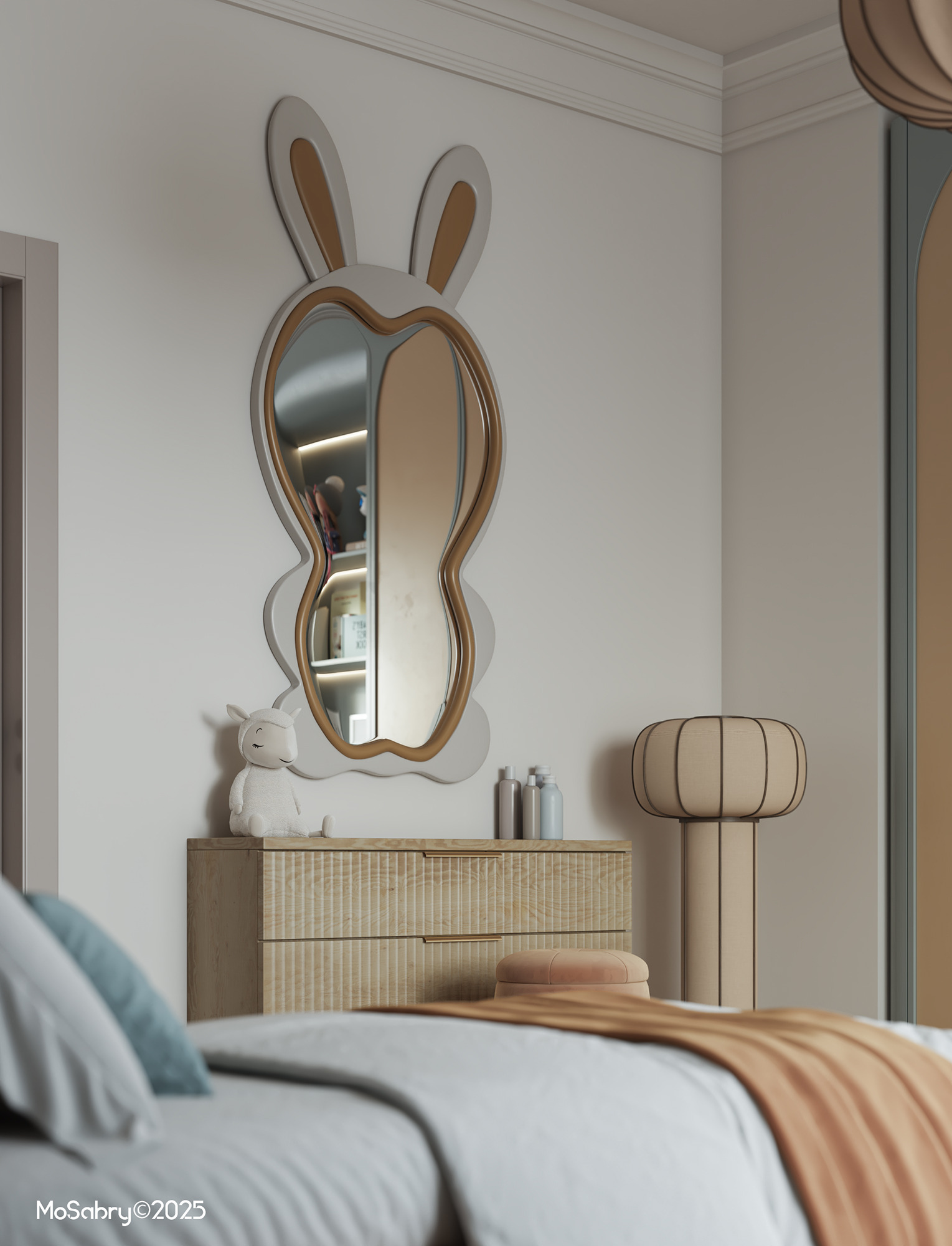 Bunny-shaped mirror above a dresser at the foot of the bed